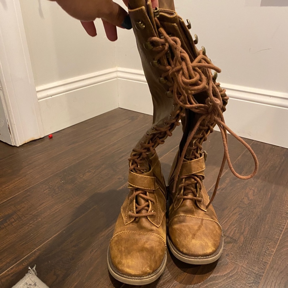 Tan laced up boots